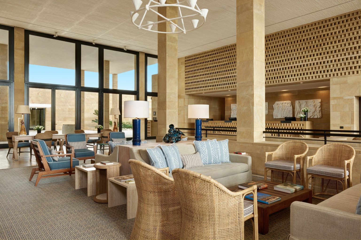 The main lobby lounge at Verdura Resort, with chandeliers and sea views