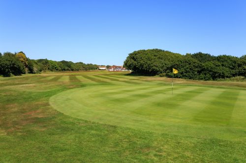 The first hole at Cooden Beach Golf Club, Bexhill-on-Sea, England