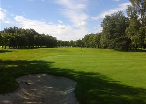 Shadows on the green at Howley Hall Golf Club, Yorkshire, England
