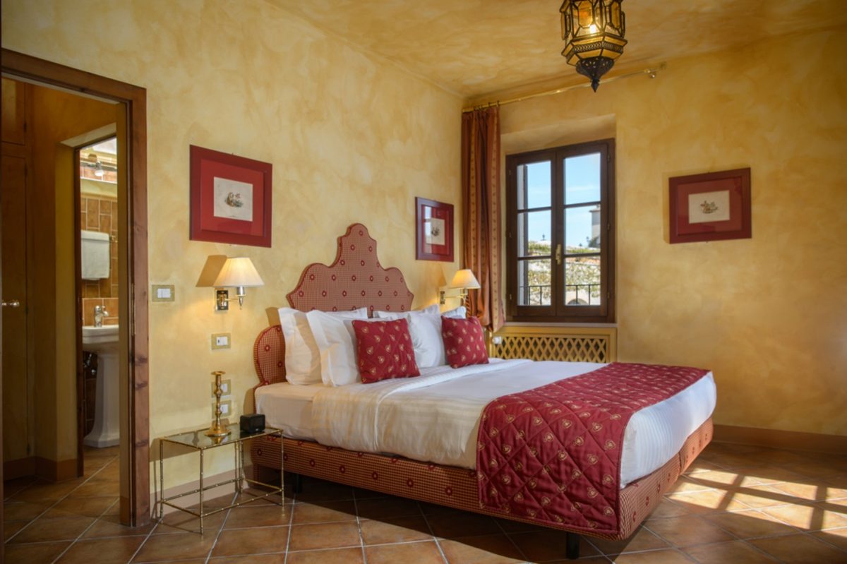 A Deluxe bedroom at La Bagnaia Golf and Spa Resort, Siena, Tuscany
