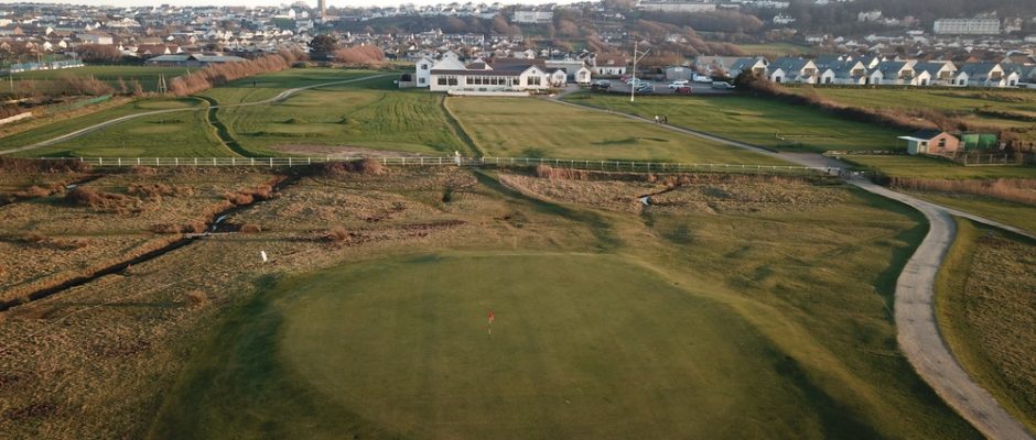 Aerial view of a green at Royal North Devon golf club, United Kingdom