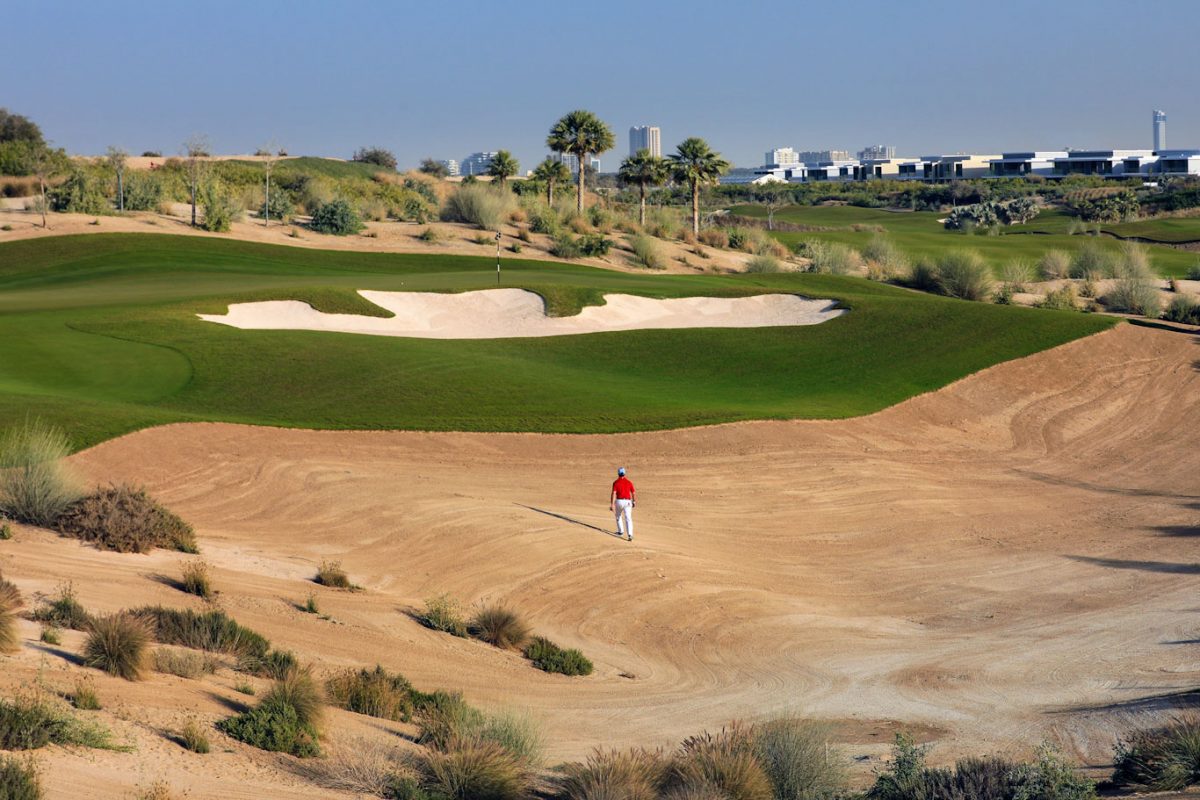 Trudging through the dunes at Dubai Hill Golf Club