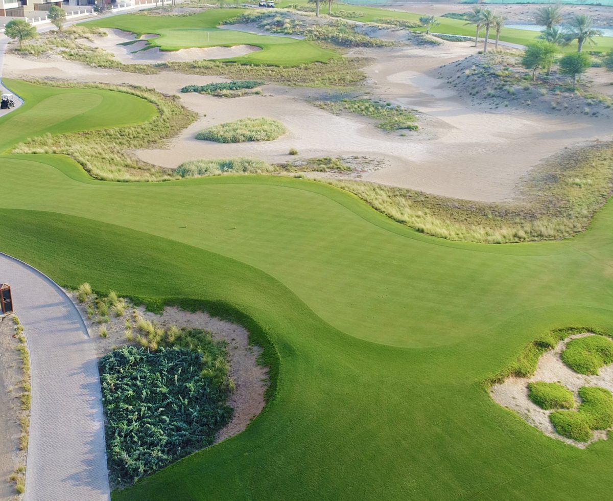 Playing towards the clubhouse at Trump International Golf Club, Dubai