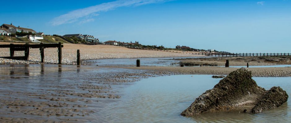 The pebble beach outside The Cooden Beach Hotel, Bexhill-on-Sea, England
