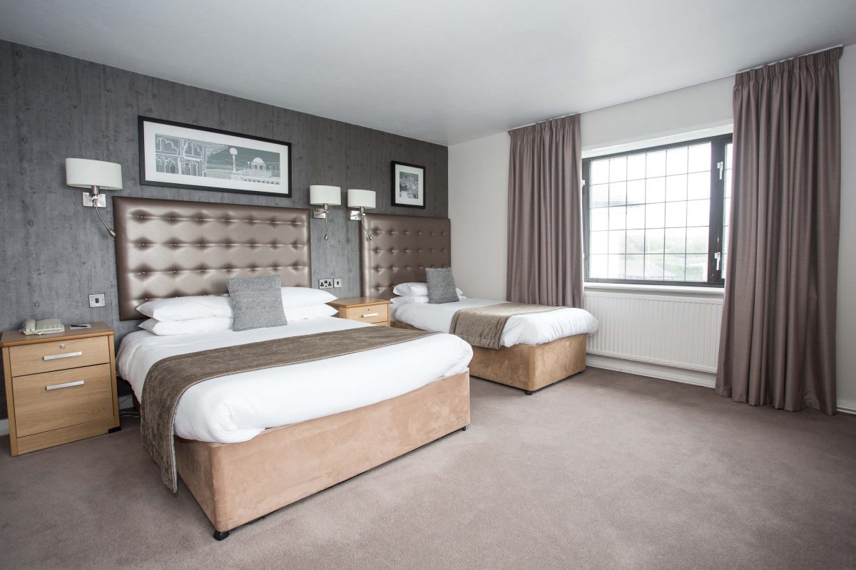 A family bedroom at The Cooden Beach Hotel, Bexhill-on-Sea, England