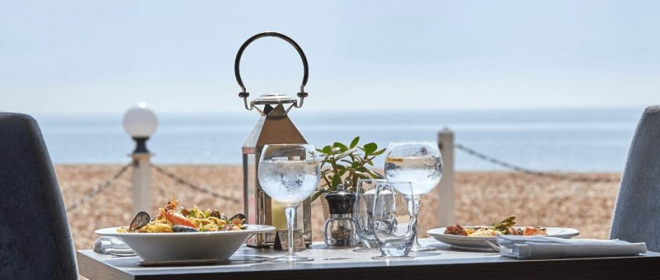 Dine on the terrace at The Cooden Beach Hotel, Bexhill-on-Sea, England
