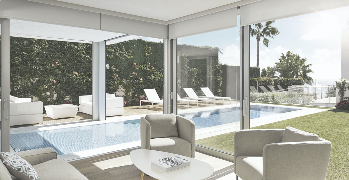 The elegant terrace and swimming pool at Puento Romano Beach Resort, Marbella, Spain