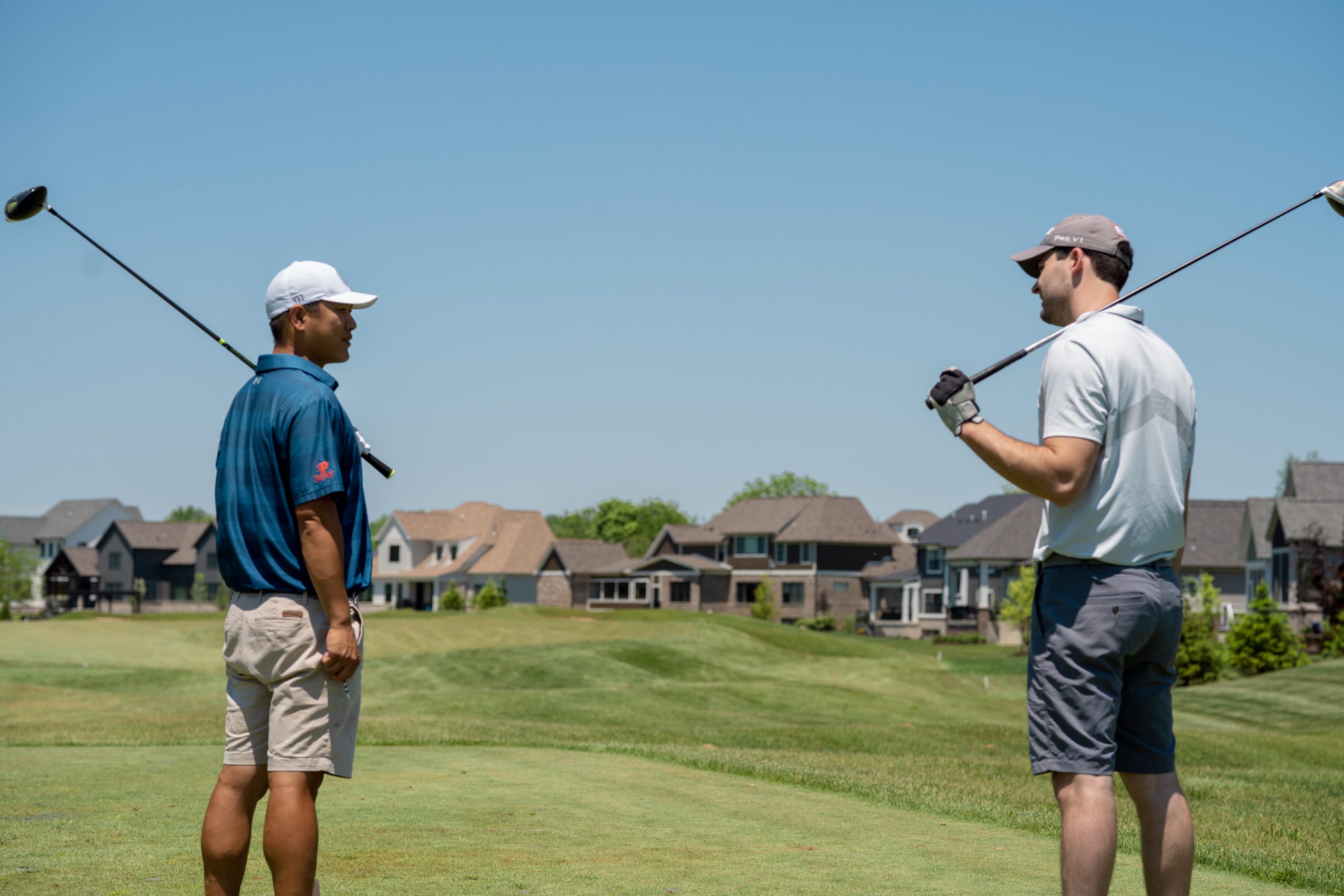 Two golfers discussing Golf Planet Holidays picture by @courtneymcook