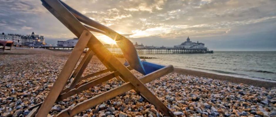 The pebble beach and Eastbourne pier a few steps from The Grand Hotel Eastbourne, England