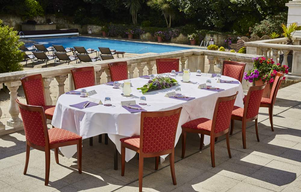 Dine by the outdoor heated pool at The Grand Hotel Eastbourne