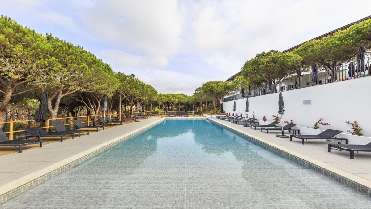The long outdoor swimming pool at Praia Verde Boutique Hotel, Castro Marim, Algarve, Portugal