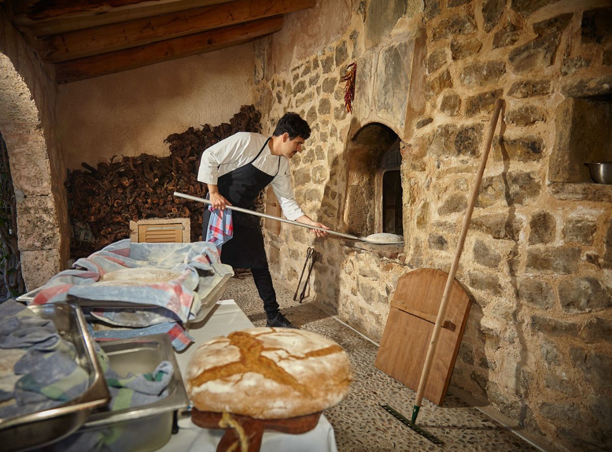 Bread being prepared in the wood oven at Pula Golf Resort, Son Servera, Mallorca