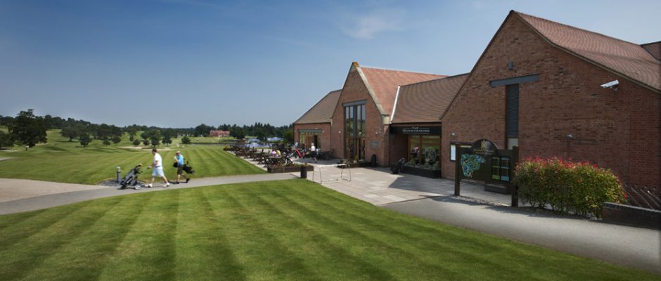Heading to the tee from The Warwickshire Golf Club clubhouse, England