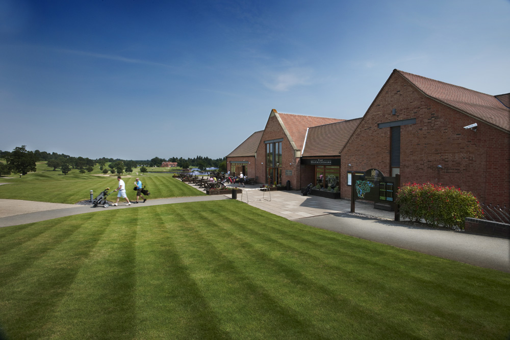 Heading to the tee from The Warwickshire Golf Club clubhouse, England