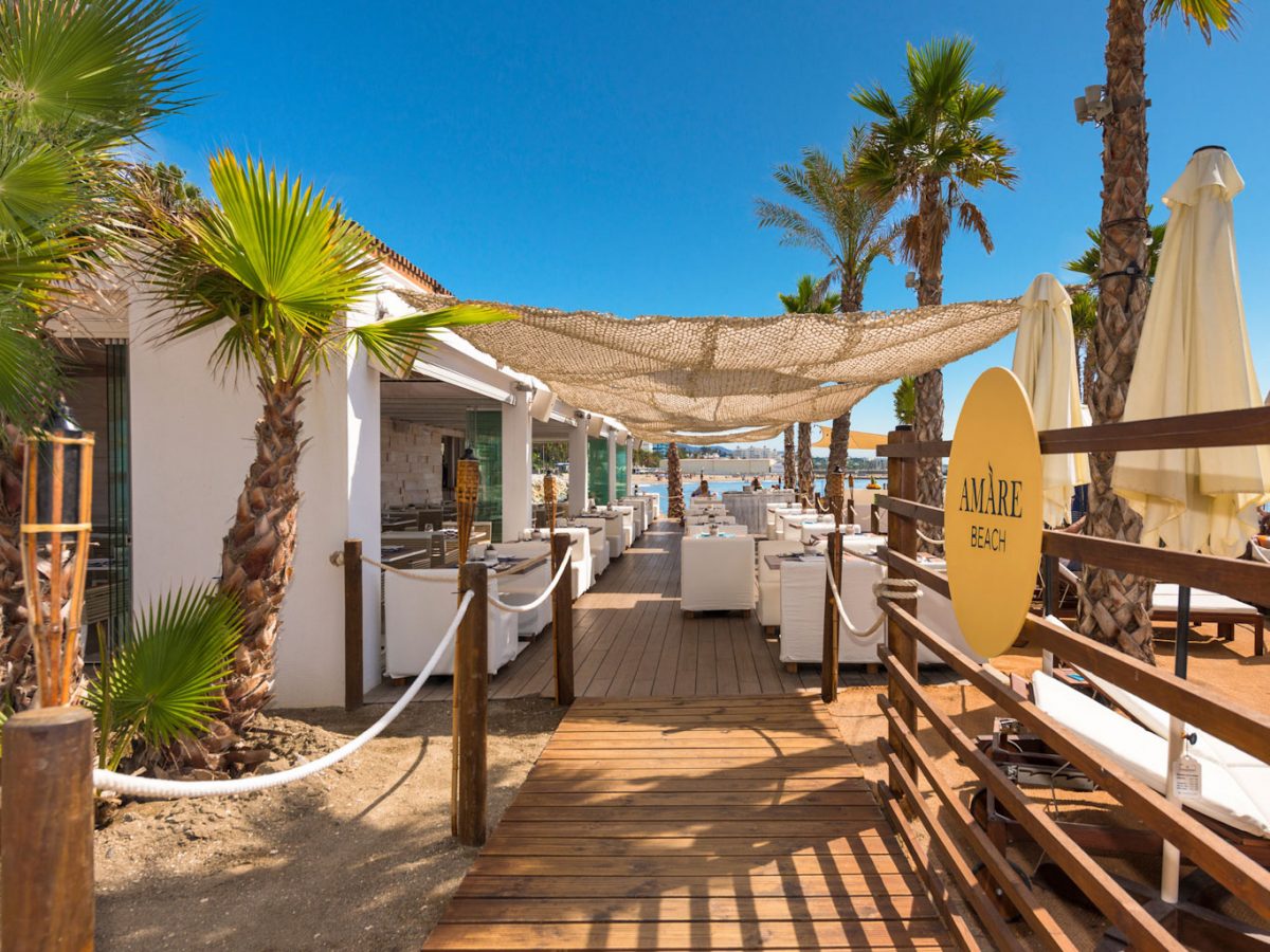 Enjoy a drink on the beach at the Amare Beach Hotel Marbella