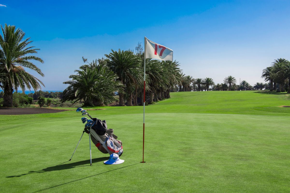 Golf bag on a green at Lanzarote Golf Club, Canary Islands