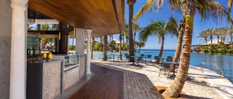 Enjoy a drink at the pool bar at Lopesan Costa Meloneras, Gran Canaria, Canary Islands