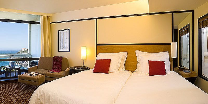 Comfortable bedrooms at Pestana Casino Park hotel Madeira
