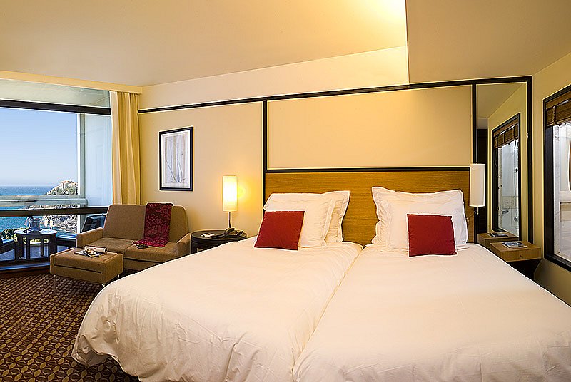 Comfortable bedrooms at Pestana Casino Park hotel Madeira