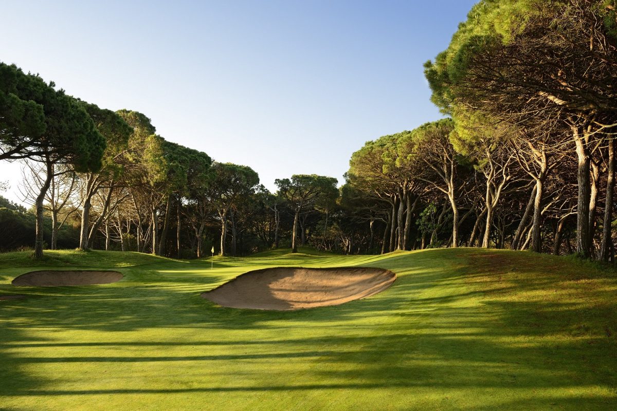 The flag is in sight on Platja de Pals Golf course, Costa Brava, Spain