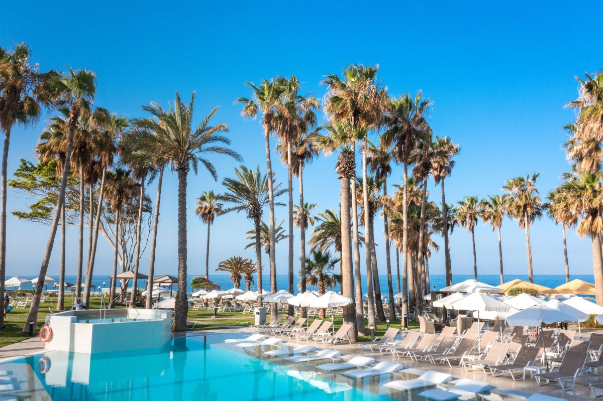 Catch some rays by the pool at the Cypria Maris Beach Hotel and Spa, Paphos, Cyprus. Golf Planet Holidays.