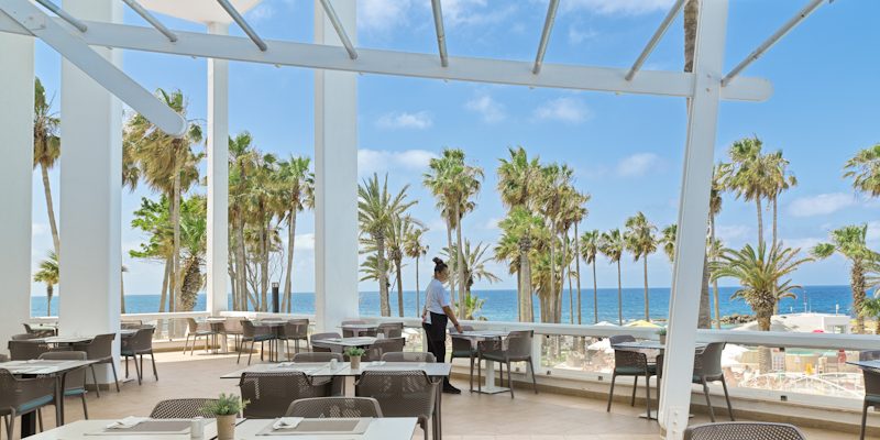 Beachside dining at the Cypria Maris Beach Hotel and Spa, Paphos, Cyprus. Golf Planet Holidays.