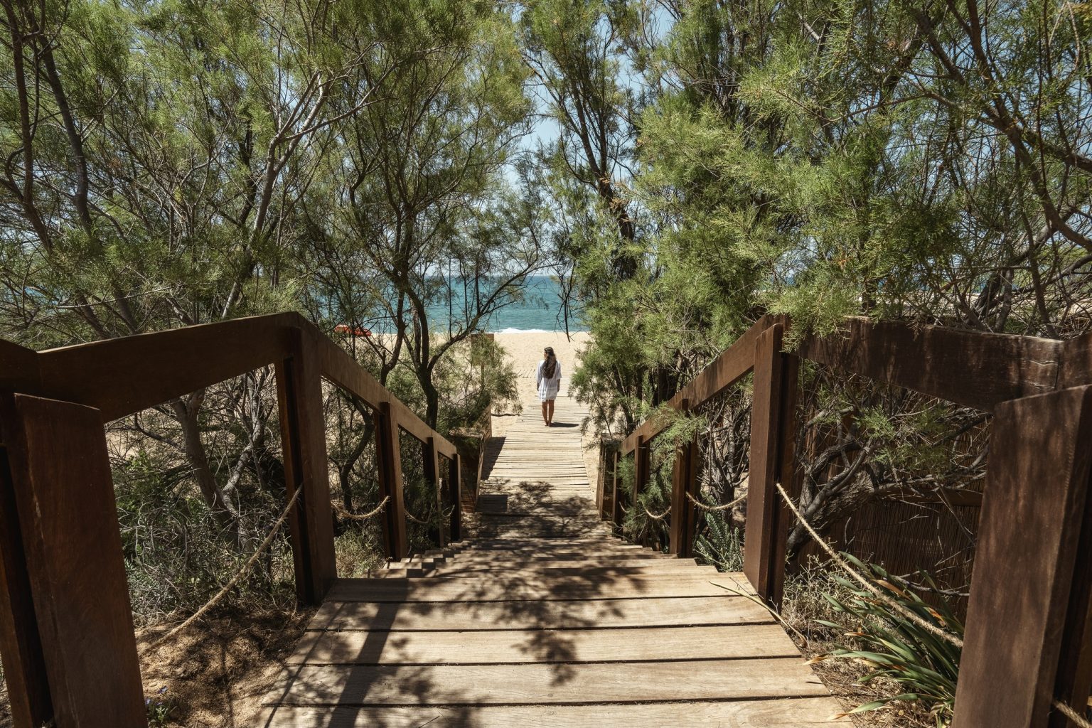 The boardwalk to the beach at The Romanos, Costa Navarino, Greece