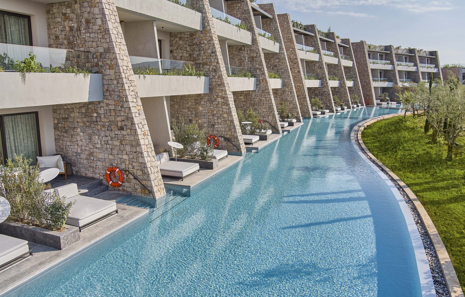 Swim-up rooms exterior at W Costa Navarino, Greece