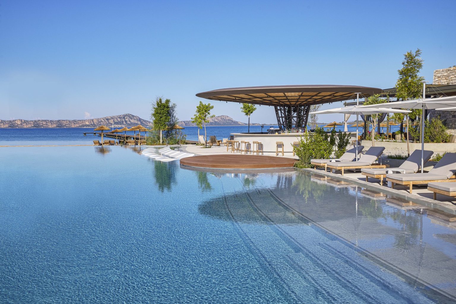 The clifftop WET Deck infinity pool at W Costa Navarino, Greece