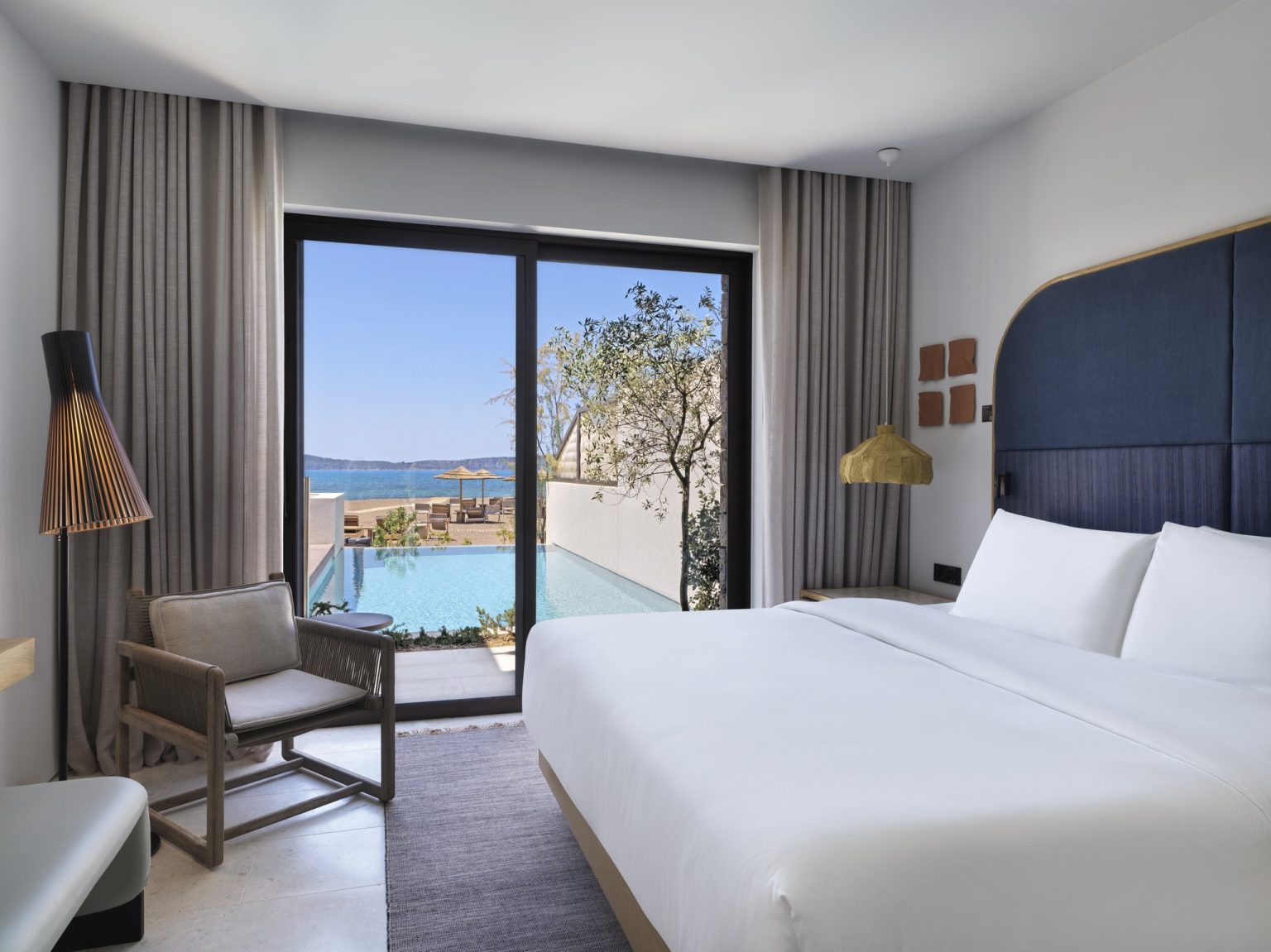 The WOW Beachfront Suite bedroom at W Costa Navarino, Greece
