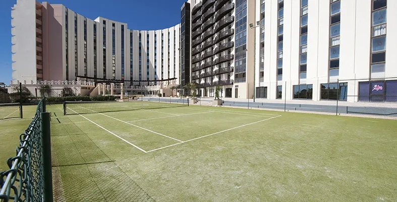 The tennis courts at Vila Gale Ampalius, Vilamoura, Algarve, Portugal. Golf Planet Holidays.