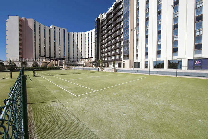 The tennis courts at Vila Gale Ampalius, Vilamoura, Algarve, Portugal. Golf Planet Holidays.