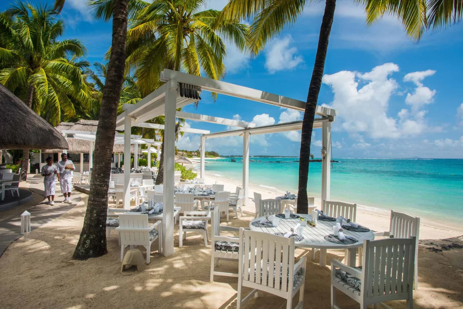 Beachside dining at Belle Mare Plage, Mauritius. Golf Planet Holidays