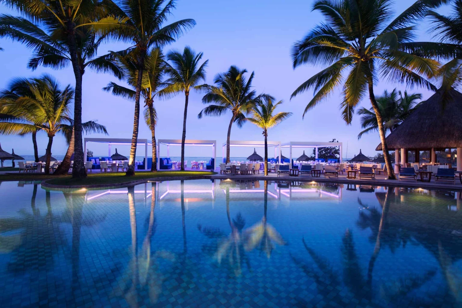 Sunset dining at Belle Maree Plage, Mauritius. Golf Planet Holidays