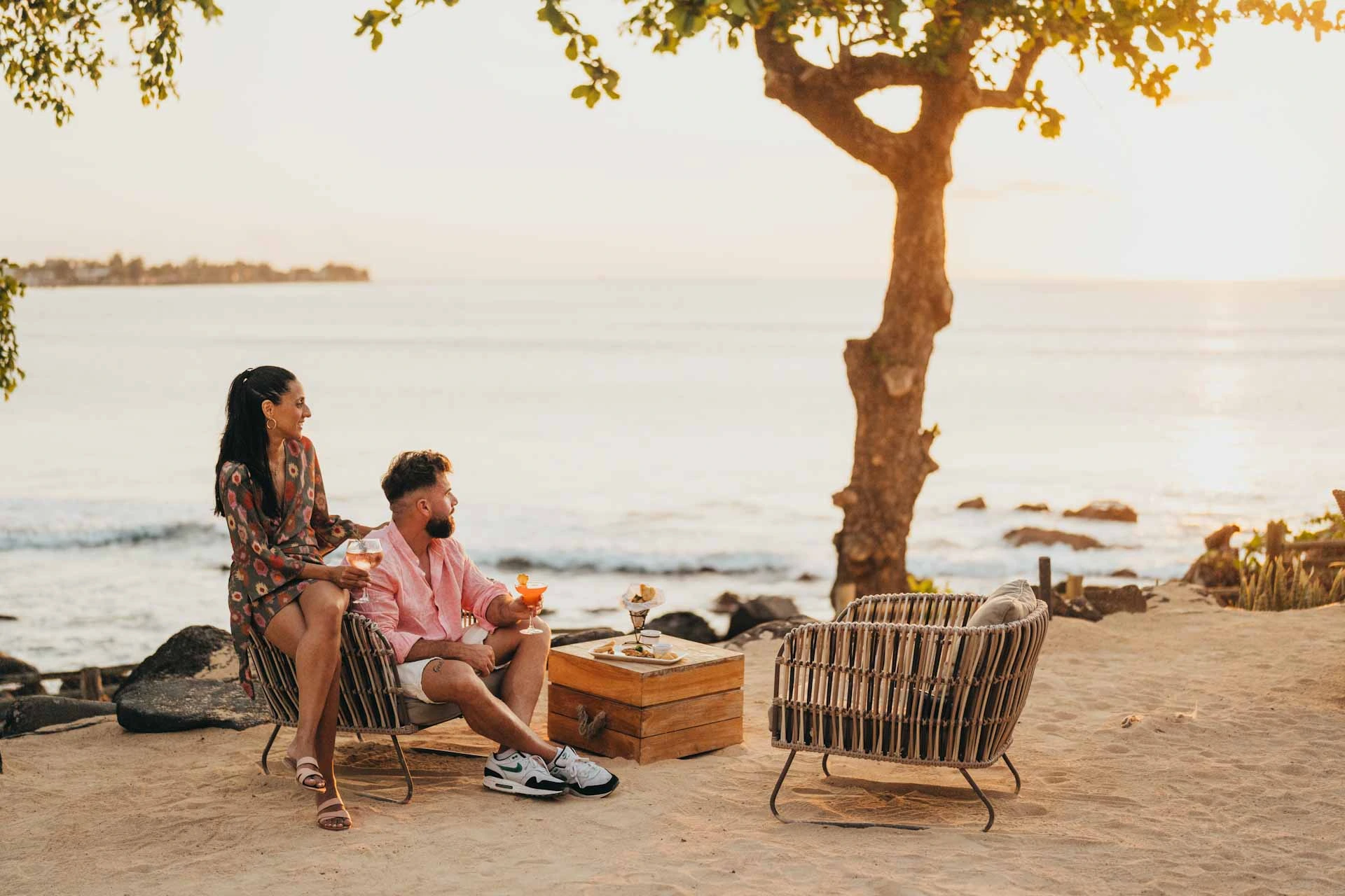 Drinks by the ocean at Tamarina Golf and Spa Boutique Hotel, Mauritius. Golf Planet Holidays.