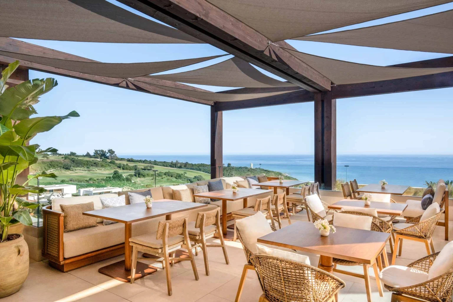 On the terrace at Fairmont La Hacienda overlooking Hacienda golf club, Costa del Sol, Spain. Golf Planet Holidays.