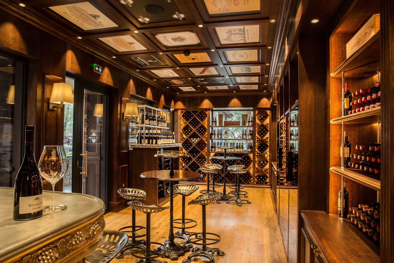 Wine cellar at Terre Blanche with bottles and tasting table